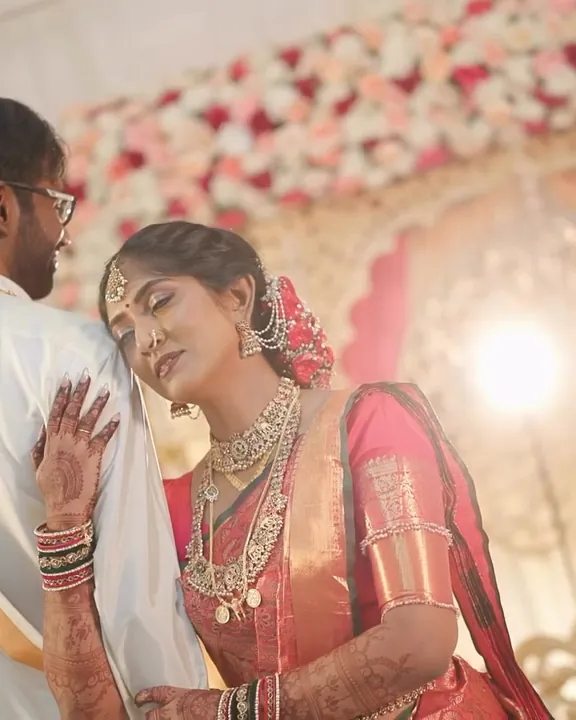 A Tamil Hindu wedding with a flower-filled wedding stage in Sri Lanka